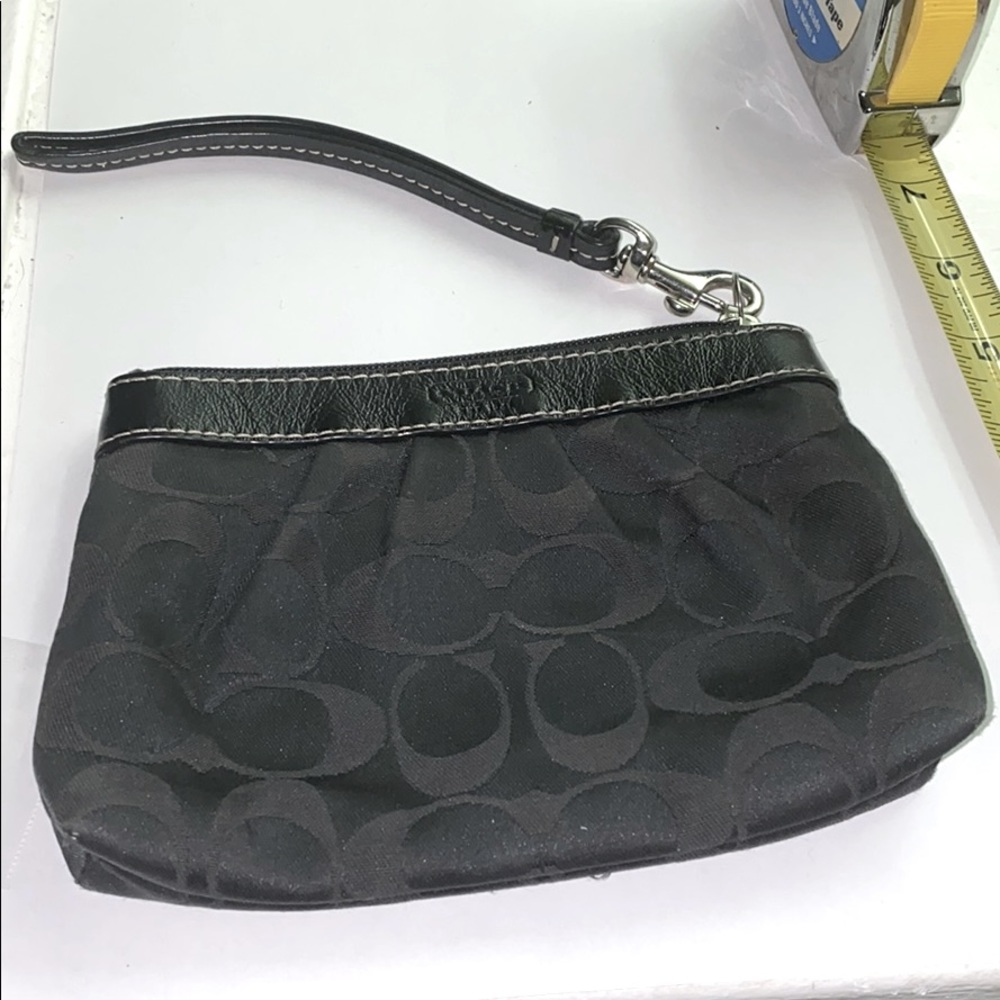 Coach black wristlet with strap